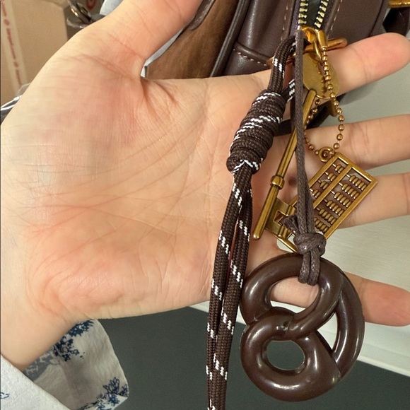 Brown Crossbody Bag with Gold Accents - Picture 2 of 3